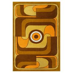 an orange and brown rug with circles on it