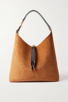 Chloé's bag is the latest addition to the house's iconic 'Marcie' collection. Crafted from suede, it has a sleek shape and enough space inside for your essentials - think wallet, keys and water bottle. The supple leather shoulder strap offers a pop of contrast while complementing the gold-tone hardware so nicely. Slouchy Tote, Slouchy Bag, Boho Trends, Black Loafers, Trending Handbag, Chloe Marcie, Bag Trends, Chloe Bag, Boho Bag