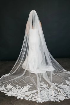 Floral Beauty Cathedral Veil Enhance your wedding ensemble with the captivating and timeless design of the Floral Beauty Cathedral Veil. Perfect for adding a touch of romance to your look, this veil will make a lasting impression on your guests and leave them in awe. Make a statement on your special day with this must-have accessory! Cathedral Veil Embroidery, Embroidered Cathedral Veil, Cathedral Veil Black, Scalloped Lace Cathedral Veil, Floral Lace Cathedral Veil, Cake Server Sets, Veil Headpiece, Heirloom Wedding, Bridal Accessories Jewelry