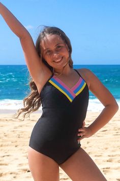 This fun & sporty one-piece swimsuit is a new favorite!! The cut & style is back by popular demand, and for good reason! Here are a few of our favorite features of the Rikki: Elastic bands in RAD colors: yellow, blue & pink Adjustable back-ties to fit all body types Sewn-in padding (sizes 12-16 only) Embroidered RAD logo on hip Fully lined in our signature embossed motto “you are beautiful” Striped Stretch Swimwear For Sports, Striped Fitted Swimwear For Sports, Playful Striped Swimwear For Beach, Playful Striped Swimwear For Beach Season, Playful Black Swimwear For The Beach, Playful Black Swimwear For Beach Season, Beachwear Swimwear With Contrast Stripes, Swimwear With Contrast Stripes For Beach Season, Playful Striped Swimwear For Poolside