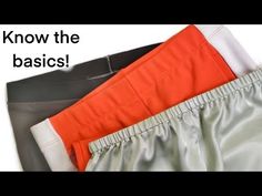 an orange and grey pair of pants with the words know the basics