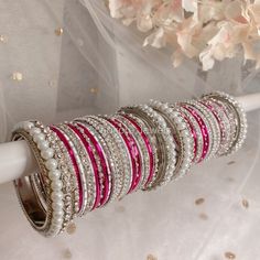 A stunning Set of two Large Silver and Chunky Pearl bangle stacks with Hot Pink shades and Silver stonework. Ready to Ship! Sold as a set for both arms only. Hot Pink Jewelry Set, Stylish Bangles, Hot Pink Jewelry, Bride Jewelry Set, Bridal Jewelery, Chunky Pearls, Handmade Flowers Fabric