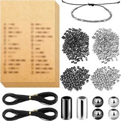 a bunch of different items that are on a piece of paper and some metal objects