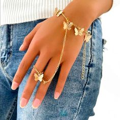 Gold Butterfly Hand Ring & Bracelet For Sale! This Bracelet Is So Cute. It Is More Like A Hand Decoration! Very Exotic, And So In Style. It Is New And From My Boutique! The Bracelet Part Is On An Adjustable Gold Chain, So It Can Be Fit To Your Desired Length. The Ring Part Is Just One Size, That Will Fit Any Size Finger. Such A Cute Bracelet To Add To Your Jewelry Collection! Aesthetic Hand Accessories, Cute Butterfly Jewelry, Grad Jewelry Gold, Butterfly Accessories Jewelry, Hand Accessories Aesthetic, Funky Gold Jewelry, Gold Bracelet Aesthetic, Grad Jewelry, 70s Butterfly