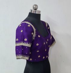 violet purple rawsilk hand embroidered sequin blouse that can be paired with multiple sarees. size: please choose the size from the drop down. if you want custom measurements,  I'll send you the measurements sheet when you order.  Please contact me if you have any questions Purple Raw Silk Traditional Wear, Designer Purple Raw Silk Traditional Wear, Elegant Purple Blouse For Reception, Purple Raw Silk Traditional Wear For Navratri, Navratri Purple Raw Silk Traditional Wear, Purple Silk Embroidered Saree Fabric, Festive Purple Embroidered Fabric For Designer Wear, Purple Traditional Wear With Dori Work For Festivals, Anarkali Embroidered Purple Silk Fabric