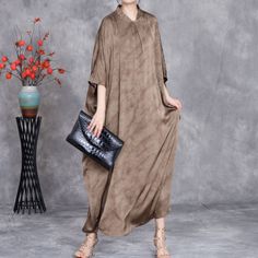 Sku CY-!126241 Material 100% Silk Style Bat Sleeve Feature Irregular, Tie-dye Neckline Stand collar Occasion Casual, Vintage Seasons Spring, Summer Type Maxi Dress Color Coffee, Yellow Size L/XL Size Chart: Please consult the size chart we provide for this item's measurements to help you decide which size to buy. Please note: There may be 1-3cm differ due to manual measurement. CM Bust ShoulderSleeve Length L/XL 192 44 116-121 Casual Brown Dress With Asymmetrical Hem, Cocoon Dress, Sleeve Gown, Bat Sleeve, Gowns With Sleeves, Modest Fashion, Stand Collar, Half Sleeves, Gowns Dresses