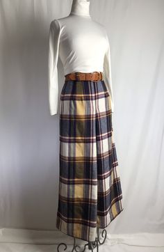 "Very pretty colors on this skirt. It also almost looks like pants, a culottes style in the front. But it's a long A line skirt. Material feels like a structured flannel but maybe not as soft ? I originally thought it was wool but now feel it's an acrylic. I don't know if I've felt this fabric too often. I just love the color palette and large plaid print. Has belt loops, belt not included , for photos only ✏️✏️✏️DETAILS ✏️✏️✏️ Brand: none Size on tag: none Fits like: x small Color: purple blue How To Style Culottes, Plaid Print Skirt, Plaid Maxi Skirt, Long A Line Skirt, Plain Skirt, Style Rock, Doll Outfits, Pretty Colors, Long A