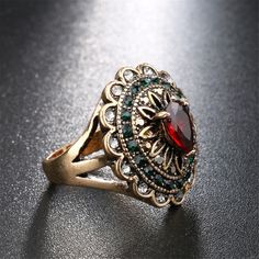 Step up your accessory collection with this goldtone ring that features sparkling cubic zirconia accents for elegant flair. Face: 0.94'' diameter Goldtone copper / crystal / cubic zirconia Copper Crystal, Wedding Accessories Jewelry, Cooking Gadgets, Red Crystals, Accessories Jewelry, Step Up, Class Ring, Wedding Accessories, Cubic Zirconia