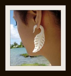 Fake Gauge white bone earrings that fancy hand made from salvage water buffalo bone, New design with post that make earring into split to give a strectched look. Earring are made for regular pierced ears size 62mm 2.40 in long 21 mm 0.8 in wide 6 mm 0.2in thick Mahalo we do special order and wholsaleing Unique White Plug Earrings, Fake Gauge Earrings, Gauge Earrings, Fancy Hands, Fake Gauges, Bone Earrings, Water Buffalo, Gauged Earrings, Lingerie Outfits