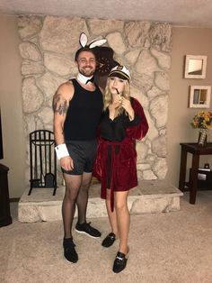 a man and woman dressed up in costumes