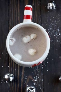 a cup of hot chocolate with marshmallows in it