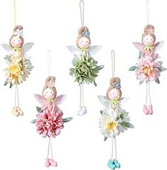 a group of ornaments hanging from strings with flowers and angel figurines on them