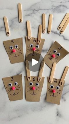 paper bag mice with numbers and eyes on them