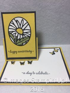 a yellow and white card with an image of a sunflower on it, says happy anniversary