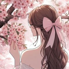 a woman with long brown hair wearing a pink bow standing in front of cherry blossom trees