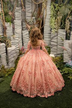 Make her feel like the princess she truly is with the Nylah Flower Girl Dress! This stunning coral gown is embellished with luxurious 3D lace floral accents, making it the perfect choice for your little one to shine on your big day. The sheer bodice features a beautiful design of 3D flowers, while the deep square neckline in the back adds an extra touch of elegance. The hidden back zipper and corset tie allow for easy adjustments, ensuring the perfect fit for your little princess. With 3/4 sheer Coral Flower Girl Dresses, Kingdom Boutique, Coral Gown, Dress For Special Occasion, Girls Communion Dresses, Princess Flower Girl Dresses, Skirt Satin, Ivory Flower Girl Dresses, Ivory Flower Girl