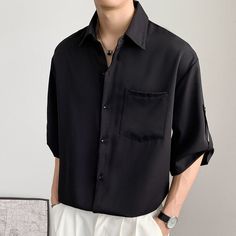 This Button Down Shirt Japanese Style Short Sleeve is perfect, just perfect. Made from a combination of cotton and polyester, the shirt is comfortable and breathable. The chic style and turn-down collar make it a fashionable choice. The solid pattern and three quarter sleeve length make it suitable for summer. This shirt is perfect for any occasion. Whether you're going out for a casual lunch or just running errands, this shirt will keep you looking stylish and feeling comfortable. It's a great Black Shirt For Summer, Trendy Solid Color Short Sleeve Shirt, Casual Button-up Short Sleeve Shirt In Solid Color, Solid Color Half Sleeve Shirt With Button Closure, Half Sleeve Shirt With Button Closure, Black Half-sleeve Summer Shirt, Black Half Sleeve Summer Shirt, Classic Shirt With Solid Color And Casual Collar, Casual Office Shirt Solid Color