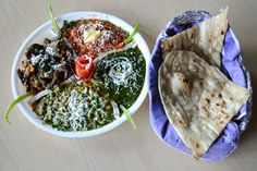 two bowls filled with different types of food