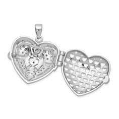 Sterling Silver Rhodium-plated CZ Fancy Design Heart 22mm Locket PendantSterling, at over 92% silver, is quite pure. Perhaps this metals most remarkable attribute is the way it ages. Silver patinas so beautifully that designers often exaggerate the quality, incorporating recesses protected from the natural polishing of everyday wear and even pre-oxidizing the surface.Designed with YOU in mind: Using our years of experience providing the top quality jewelry through our stores in Northern Florida, Silver Locket For Valentine's Day, Silver Heart Pendant Jewelry With Hallmark, Silver Heart Cut Locket Jewelry, Silver Open Heart Locket Jewelry, White Gold Filigree Heart Jewelry, Silver Double Heart Jewelry With Hallmark, Silver Heart Cut Jewelry For Keepsake, Silver Heart Cut Keepsake Jewelry, Silver Double Heart Jewelry With Polished Finish