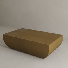 a brown box sitting on top of a white table