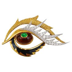 A rare vintage brooch by Cartier made of 18 karat yellow and white gold with gemstones and enamel. This dainty vintage Cartier brooch is artistic and dramatic. The stylized eye comprises a whole set of the essential elements. It has a hammered gold eyebrow and a line of the white gold eyelashes embellished with diamonds. The lower eyelid is underlined with black enamel. The eye accented with a cabochon emerald and orange quartz. This Cartier vintage pin is as sophisticated as it’s edgy. Being ageless as any true piece of art, the brooch looks contemporary in any era. This vintage Cartier brooch is made of 18 karat yellow and white gold, black enamel and accented with round brilliant cut diamonds (G-H color, VS1 clarity, total weight approximately 1.88 carats), orange quartz and 0.37-carat Cartier Brooch, Cartier Diamond Rings, Cartier Vintage, Orange Quartz, Luxury Jewelry Brands, David Webb, Bracelet Love, Cartier Jewelry, Hammered Gold