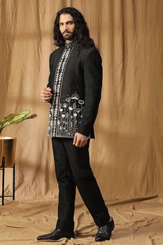 Black bandhgala with pearl and mirror embroidery. Paired with a silk straight pant. - Aza Fashions Elegant Nehru Jacket With Mirror Work For Festive Occasions, Elegant Straight Kurta Bandhgala For Party, Elegant Semi-stitched Black Bandhgala, Fitted Traditional Wear With Pearl Embroidery For Designer Wear, Elegant Black Semi-stitched Bandhgala, Fitted Traditional Wear With Pearl Embroidery For Festivals, Festive Fitted Kurta With Pearl Embroidery, Elegant Nehru Jacket With Mirror Work For Transitional Season, Designer Festive Bandhgala With Mirror Work