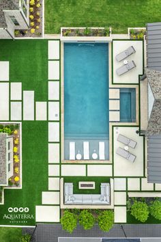 an aerial view of a swimming pool and patio