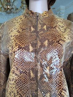 Italy  jacket L brown Leather Clothing womens  jacket  womens Leather jacket Crop jacket snake print jacket  zip jacket brown jacketMade in Italyheight of the woman in the photo - 180 cmPlease refer to photos for details of condition. Condition: used, signs of age and wear see picturesMeasurements:Length: 60 cm/23.6"Shoulder to shoulder: 45 cm/17.7"Sleeve : 62 cm/24.4"Bust: 106 cm/ 41.7"Waist 100 cm/39.4" Size: LnoteThe color on the pictures may vary due to monitor settings and light reflections Fall Leather Jacket With Snake Print, Fall Snake Print Long Sleeve Outerwear, Purple Leather Jacket Lyst, Fall Snake Print Leather Jacket, Womens Leather Jacket, Luxury Winter Snake Print Outerwear, Formal Blouses, Jacket Crop, Long Fur Coat