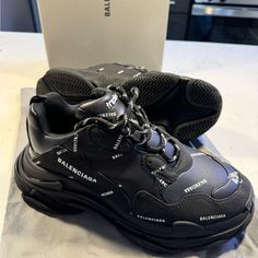 New Condition! Box Included! Only Worn Once** Size 43 Mens Equivalent To A Size Us 10 Mens Leather Free Sneaker Technical Material Printed Balenciaga Allover Logo Complex 3-Layered Outsole Embroidered Size At The Edge Of The Toe Embroidered Logo On The Side Embossed Logo In The Back Triple S Rubber Branding On The Tongue 2 Laces Loops Including 1 Functional Lacing System Featuring 12 Fabric Eyelets Bicolor Laces Recalling Hiking Boots’ Laces 1 Additional Pair Of Laces Back And Tongue Pull-On Tab Shoes Balenciaga, Balenciaga Triple S, Mens Leather, Lace Back, Embossed Logo, Mens Shoes Sneakers, The Edge, Leather Men, Hiking Boots