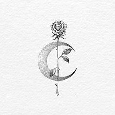 a drawing of a rose sitting on top of a crescent