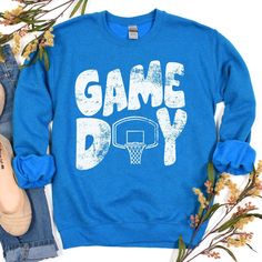 This makes the perfect vintage school spirit basketball sweatshirt! Game Day! This distressed gameday sweatshirt is great for the sports moms and gift for basketball fans! This vintage basketball goal is perfect on the popular Gildan brand sweatshirt. This vintage style basketball sweatshirt will keep you warm throughout the sports season! A pre-shrunk, classic fit sweater that's made with air-jet spun yarn for a soft feel and reduced pilling. ** P R O D U C T ** - 50% cotton, 50% polyester - Pr Gameday Sweatshirt, Spirit Game, Basketball Goal, Basketball Mom Shirts, School Spirit Wear, Basketball Sweatshirts, Vintage Basketball, Basketball Mom, Vintage School