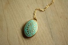 Gold & Aqua Blue Locket $25.50 Formal Blue Locket Jewelry, Elegant Blue Locket Necklace Gift, Antique Blue Locket Jewelry, Oval Blue Locket Necklace, Blue Bohemian Locket Jewelry, Gold Locket Necklace, Oval Locket, Gold Locket, Oval Pendant