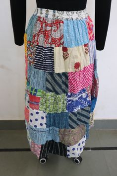 Adjustable Waist Size: One Size; Fits up to US Size Large Waist: Fits up to Approx. 36 inches Length: Approx. 39 inches HIPS: Fits up to Approx. 38 inches This long patchwork skirt has an elasticated waist for comfort and can easily be pulled on over the head or up from the ankles as desired. Always one of a kind patchwork boho style long floaty skirt for festivals and parties Lightweight and comfy made of cotton colorful materials SINCE THIS SKIRT IS MADE OF DIFFERENT PATCHES OF SARI, THE ONE YOU WILL Cotton Patchwork Flowy Maxi Skirt, Blue Patchwork Relaxed Fit Skirt, Long Cotton Patchwork Skirt, Cotton Patchwork Long Skirt, Multicolor Patchwork Tiered Skirt Bottoms, Cotton Long Skirt With Patchwork, Blue Patchwork Maxi Skirt For Summer, Blue Patchwork Skirt, Blue Long Patchwork Skirt