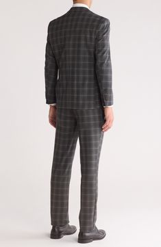 Impeccably tailored in windowpane-patterned fabric, this three-piece suit features a softer shoulder for a more natural profile. Jacket has notched lapels; four-button cuffs; chest pocket; flap pockets; interior pockets Vest has front welt pockets; adjustable back half belt Trousers have zip fly with hook-and-bar closure; slant pockets; back button-welt pockets Unhemmed Jacket is lined; trousers are lined to the knee 63% Terylene polyester, 35% rayon, 2% spandex Dry clean Imported Pocket Vest, Three Piece Suit, Nordstrom Store, Patterned Fabric, Three Piece, Welt Pockets, Flap Pocket, Welt Pocket, Chest Pocket