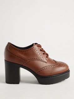 FIT Extra wide width (WW): Our unique fit gives you extra wide width and extra room around your whole foot. Extra cushioned footbed. 3. 5” heel. MATERIALS + CARE 100% polyester. . Imported. DETAILS Almond toe. Lace up closure. . Oxford details. . The best plus size women's Heeled Lace-Up Oxford (WW) Shoes in brown. Rock your look from Torrid to Festivals like Coachella and Lollapalooza, a concert, a show, or just for fun! Torrid is your destination for cozy fall and winter clothes to keep you wa Wide Fit Cushioned Block Heels, Fall Wedge Heels With Reinforced Heel, Synthetic Platform Heels For Work, Classic Platform Heels For Fall, Fall Medium Width Wedge Heels, Brown Ankle-high Heels For Work, Ankle-high Brown Heels For Work, Classic Platform Heels In Synthetic Material, Wide Width Synthetic Heels With Round Toe