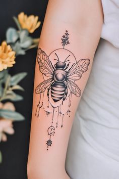 Detailed tattoo of a bee with floral elements on a person's arm. Unique Bee Tattoo, Worthy Tattoo, Bee Tattoo Design, Bee Tattoo Ideas, Bee Silhouette, Bumble Bee Tattoo