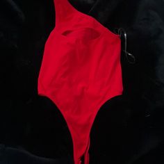 Cut Out Piece On Top Of Chest, Size M/L, Very Stretchy Material, Very Flattering, Nwot, Red In Color, Buttons At The Bottom Making It Easy To Come Off! Trendy Red Bodysuit For Beach, Red Sleeveless Bodysuit For Club, Red Sleeveless Swimwear For Party, Red Sleeveless Party Swimwear, Red Bodysuit For Summer Night Out, Red Beachwear Bodysuit With Lined Body, Red Lined Bodysuit For Beachwear, Red Party Bodysuit With Lined Body, Red One-piece Swimwear For Night Out