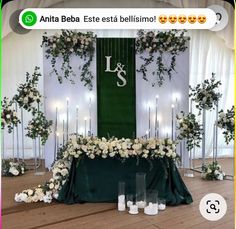 the table is set up with candles and flowers