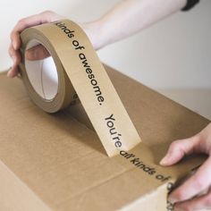 someone is wrapping up a brown box with a roll of tape that says, what do you come from?