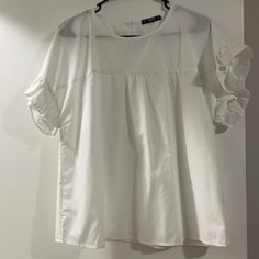 White Ruffle Sleeve Top White Blouse With Ruffle Hem And Flutter Sleeves, White Flowy Blouse With Ruffle Sleeves, Daytime Ruffled Short Sleeve Blouse, White Ruffled Blouse For Daytime, White Ruffle Sleeve Top, Yellow Halter Top, Heart Blouse, Black Cami Top, Satin Crop Top