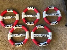 four red and white life preservers with the words rescue, when you're wrong