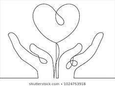 two hands holding a heart shaped object