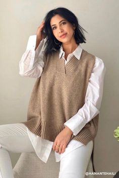 Lyla Oversized Knit Vest Enjoy newtro vibes! Featuring a super cozy wool blended knit material all over, a ribbed V-neck, an oversized fit, an asymmetric hem length silhouette, and pull on style * Product Specification Wool 55% Polyester 23% Nylon 22% * Flat Measurement: S/M: Shoulder: 32??(12.6in) / Bust: 65??(25.6in) / Length: 79??(31.1in) * Professional Clean OnlyModel's height is 5'7" (176cm) Bust 32in Waist 24in Hip 35in and wearing S/M Cozy V-neck Sweater Vest For Fall, Oversized Neutral V-neck Sweater, One Size V-neck Sweater For Fall, Oversized Beige Wool Sweater, Fall Sweater Vest For Layering, Trendy Beige Knitted Sweater Vest, Casual Winter Sweater Vest, Everyday Wool Sweater In Soft Knit, Trendy Knitted Sweater Vest For Layering