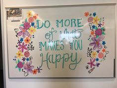 a sign that says do more of what makes you happy with flowers and butterflies around it