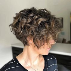 Short Wavy Hair with Stacked Layers Short Sassy Curly Haircuts, Stacked Bob Wavy Hair, Stacked Pixie, Curly Stacked Bob Haircut, Short Wavy Hair With Volume, Short Curly Layered Bob, Wavy Asymmetrical Pixie, Angled Bob Short Stacked Curly Hairstyles