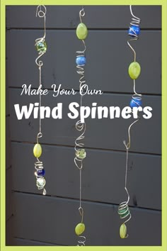 a wind spinner hanging from the side of a building with text overlay that reads make your own wind spinners