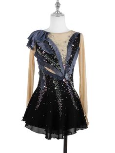 a black and blue dress with sequins on it