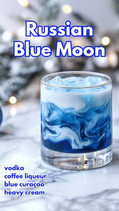 The Russian Blue Moon is a visually striking cocktail with a ghostly blue hue and creamy texture, combining vodka, coffee liqueur, and blue curaçao. This layered drink is perfect for an eerie evening or festive gathering, giving a fresh twist to the classic White Russian. via @mybartender Christmas Cocktails Vodka, Blue Curacao Drinks, Christmas Vodka, Bartender Drinks Recipes, Layered Drinks, Bartender Drinks, Pretty Alcoholic Drinks, Cocktail Drinks Alcoholic, Coffee Liqueur