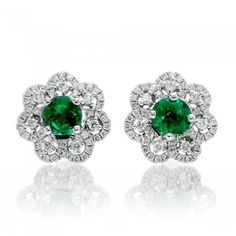 METAL SPECIFICATIONS Metal Name: White Gold 14K STONE SPECIFICATIONS Stone Name: EMERALD/DIAMOND Stone Cut : Round cut Stone Specifications: There are two green emerald approx. 2.00 carats each & approx.0.75 carats round smaller diamonds on side in each earring Natural earth-mined diamonds Total Stone Weight : approx. 5.50 carats Color : Green/F Clarity : AAA/VVS1 APPRAISAL Appraised Value : $ 11799.00 Comes with a FREE APPRAISAL All kind of customization and options available for Metals, Di Halo Diamond Earrings, 3 Carat Diamond, Halo Earrings, Emerald Earrings, Diamond Flower, Emerald Jewelry, Diamond Stud, Green Emerald, Simple Earrings