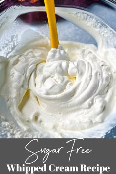 a spoon with whipped cream in it and the words sugar free whipped cream recipe below